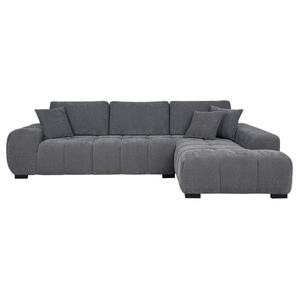 rounded arms and plush waterfall seat cushions adorned with subtle grid tufting. Soft