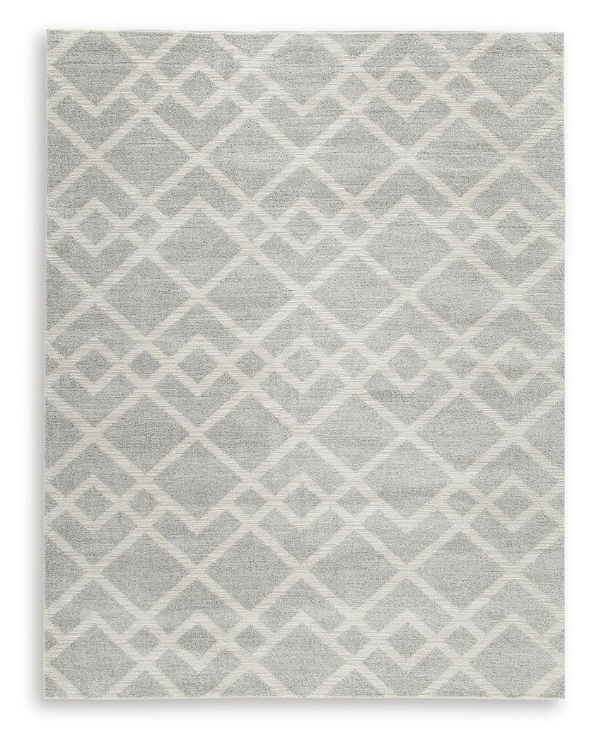 Time for a floor refresh? This trend-right rug is buzzing with interest and newfound energy. Its dynamic geometric design is grounded by subtle shades of gray and ivory that complement so many settings. Weâ€™re talkinâ€™ a treat for your feet and a feast 