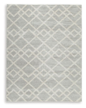 Time for a floor refresh? This trend-right rug is buzzing with interest and newfound energy. Its dynamic geometric design is grounded by subtle shades of gray and ivory that complement so many settings. Weâ€™re talkinâ€™ a treat for your feet and a feast 