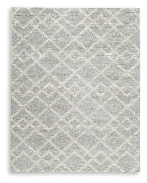 Time for a floor refresh? This trend-right rug is buzzing with interest and newfound energy. Its dynamic geometric design is grounded by subtle shades of gray and ivory that complement so many settings. Weâ€™re talkinâ€™ a treat for your feet and a feast 