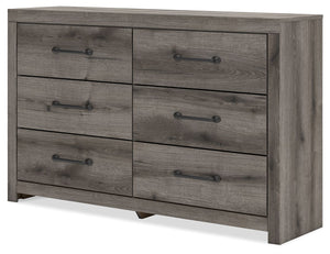  from clothes to bed linens. Elongated drawer pulls in a dark hue polish off the look