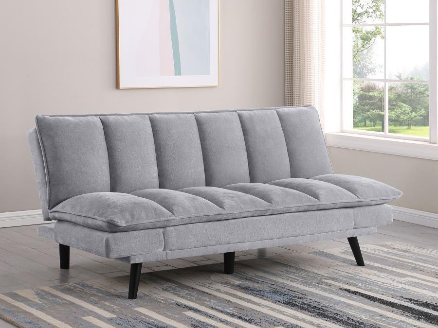 Versatility reigns in a modern sofa bed. Soft upholstery complements perfectly, bringing inviting style to a convertible design. It goes from sofa to bed with a lay-flat mechanism, perfect for a multi-functional space like a home office or compact living 