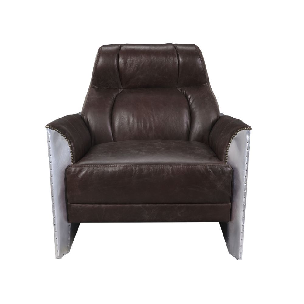 The Brancaster accent chair will be an instant centerpiece to any room. This handsome piece is an excellent update to the traditional club chair. Bold details, such as nail-head trim on the sloped armrests, acknowledge its classic roots. To build its look