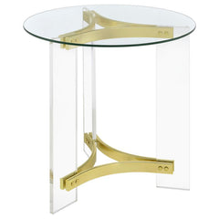This elegant round end table features a clear tempered glass top and sturdy clear acrylic legs. The matte brass electroplated metal frame supports the piece with a touch of luxury. The minimalist design offers both style and function, making it a perfect 