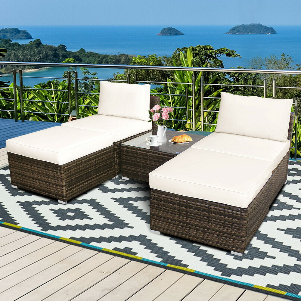 Power coated and solid steel frame adds sturdiness of the set<br>Tight and hand-woven rattan to withstand the change of weather<br>Exquisite table has a removable glass which is easy to clean<br>Aluminum feet at bottom protect bottom rattan and prevent sl