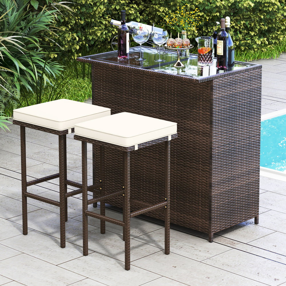 Strong metal frame and wrapped with rattan wicker<br>Including 2 stools and 1 table<br>Special design of the shelve for storage<br>Tempered glass top with good heat-durability<br>Soft and thick cushion provides comfortable sitting experience<br>Zippered c