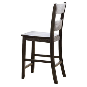 Complete your dining space with the sophisticated Haddie dining room set. This transitional group features a distressed finish with the understated styling of rustic design. The table features a sophisticated trestle base with crossbar support and grooved
