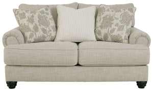 This loveseat has an alluring look that-'s guaranteed to turn heads. Richly textured fabric in a light, easygoing hue is enhanced by even lighter flax peeking through. Distinctive roll arms add a dab of debonair, while indulgently plush cushions cradle yo