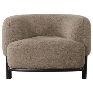  enduring lines that create a welcoming ambiance. Heavily textured upholstery adds neutral allure