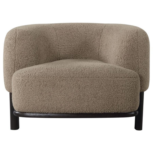  enduring lines that create a welcoming ambiance. Heavily textured upholstery adds neutral allure