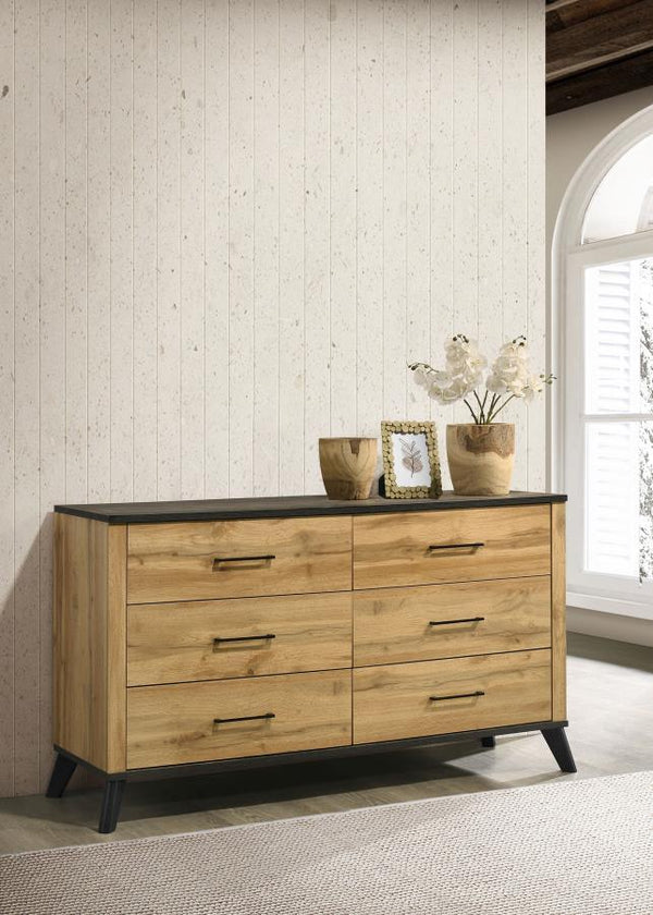  combining mid-century modern design with a rustic wood grain effect. The weathered brown and natural pine finish is beautifully complemented by matte black finished metal pull handles. Cr