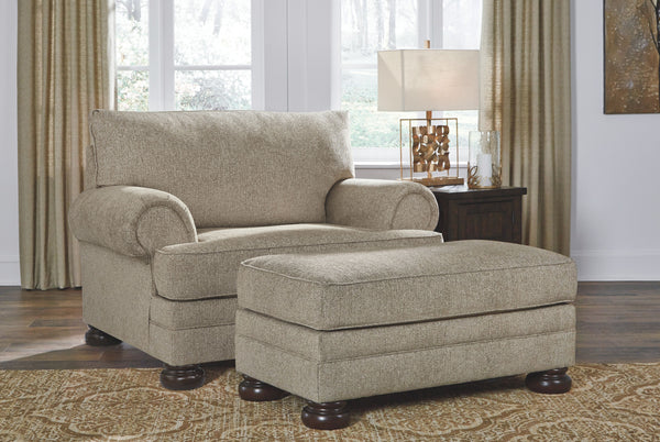 For a fresh spot in your space, turn to this designer chair and ottoman. Wind down at the end of a long day when you sink into this canyon of comfort. <h4><b>Kananwood - Oatmeal - Chair and a Half</b></h4> <table width=-"100%-"><colgroup><col style=-"widt
