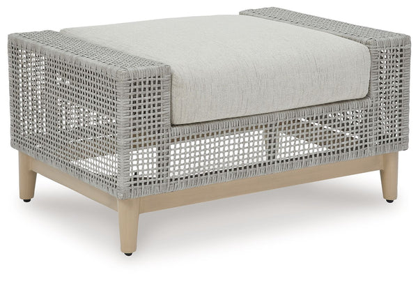 This ottoman invites your casual contemporary style outdoors. With its resin wicker in a chic neutral hue, it expertly marries refined design with durability. Breezy summer mornings and cold winter nights are made all the more comfortable with high-perfor