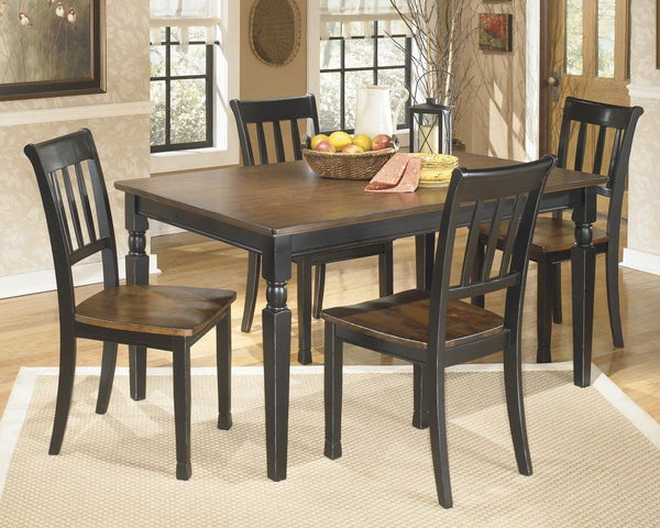 Made with select veneers and hardwood solids in a two-tone finish. Table tops and chair seats are finished in a burnished brown color. The chair frames and table bases are finished in cottage black paint. Glued and screwed corner block construction. <h4><