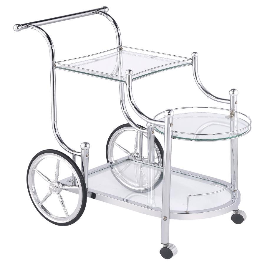A fun traditional theme offers delightful charm that works perfectly in a traditional or transitional space. This serving cart mimics old fashioned style as it aids in delivering food and spirits to eager guests. Enjoy the captivating look of rustic wheel