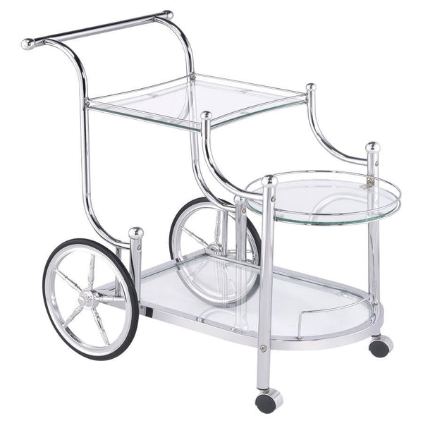 A fun traditional theme offers delightful charm that works perfectly in a traditional or transitional space. This serving cart mimics old fashioned style as it aids in delivering food and spirits to eager guests. Enjoy the captivating look of rustic wheel