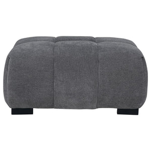  neutral upholstery and subtle grid tufting bring depth and texture to your dÃ©cor