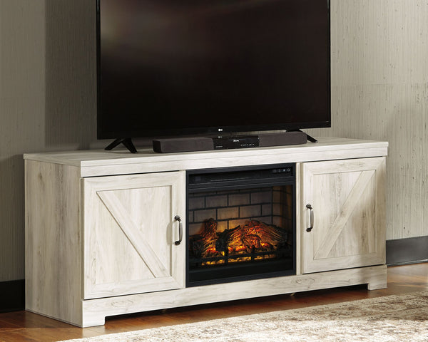 Express your farmhouse style with this TV stand with fireplace insert. Its wispy white finish over replicated oak wood grain is a delightful change from the ordinary. Clean-lined, classic styling with barn door inspiration provides a country chic aestheti