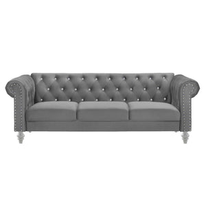  it offers cozy and indulgent seating for three. The glam tailoring features tufted backs and arms adorned