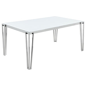 Clean lines and sleek materials give this dining table a distinctly modern edge. The white frosted tempered glass top offers a bright, airy look, while the polished stainless steel frame delivers durability and shine. Designed with geometric, hairpin-insp