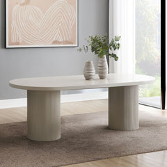 Introduce our Laela dining set, featuring an oval wooden top and sturdy double pedestals, combines elegance with modern design. The fixed table top provides a stable surface for your dining needs, while the upholstered side chairs offer comfort and style.