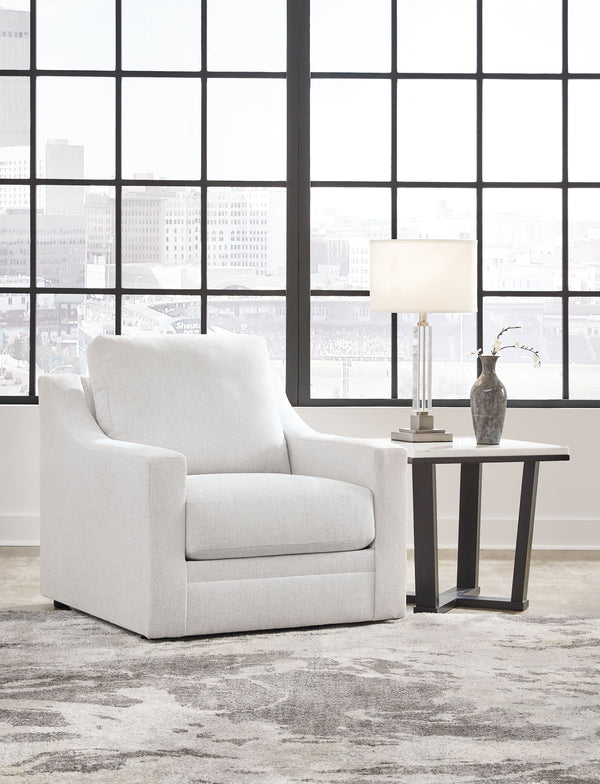  textured upholstery adds a luxurious high-end touch to the classic design. The chair-'s plush reversible seat cushion and pillowy back beckon you to sit