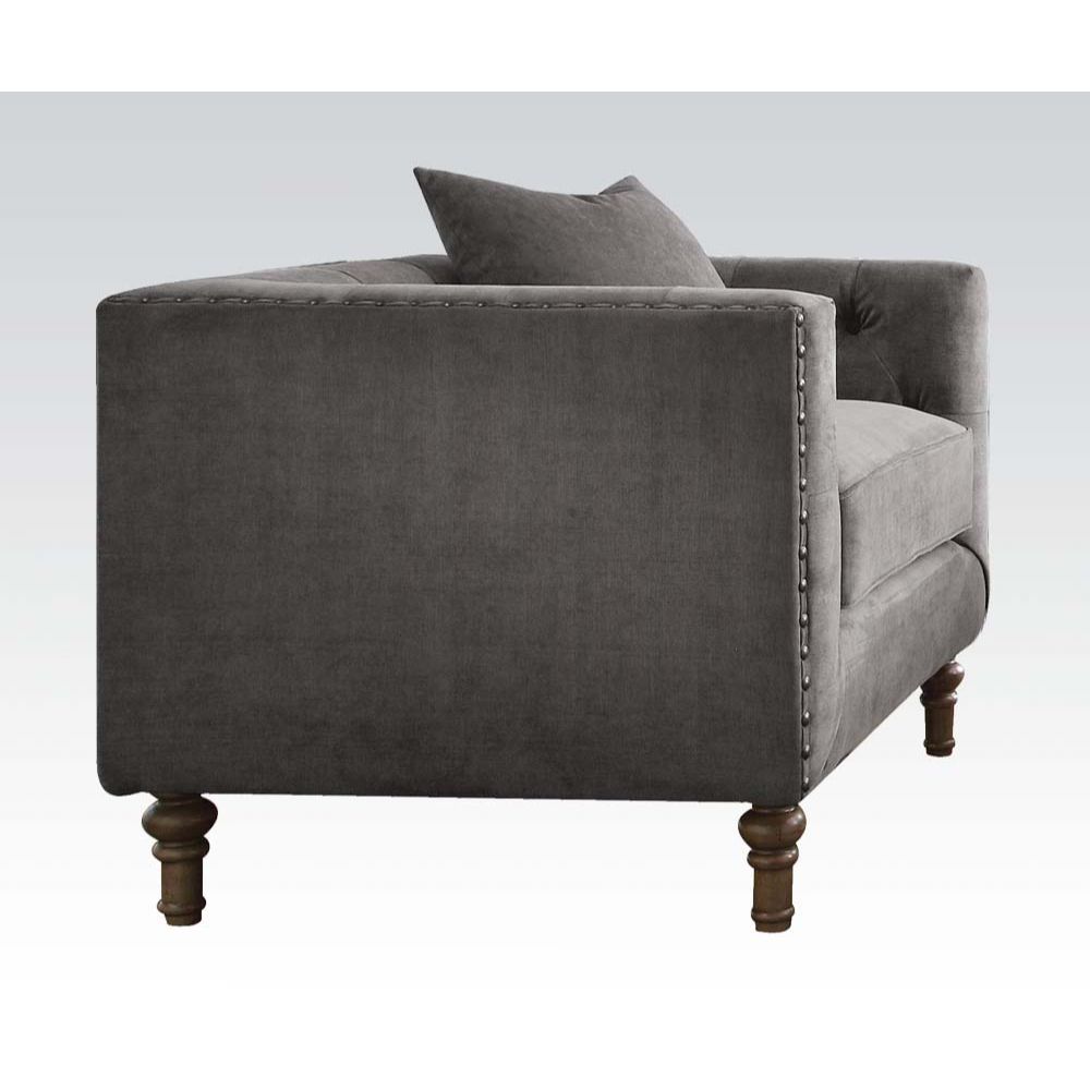 Sidonia collection is a distinct piece that intersects the mid-century and today. Expertly handcrafted in selected velvet fabric, features tufted back cushion, high shelter armrest with nailhead trim and wooden turned leg. Complemented by overstuffed seat