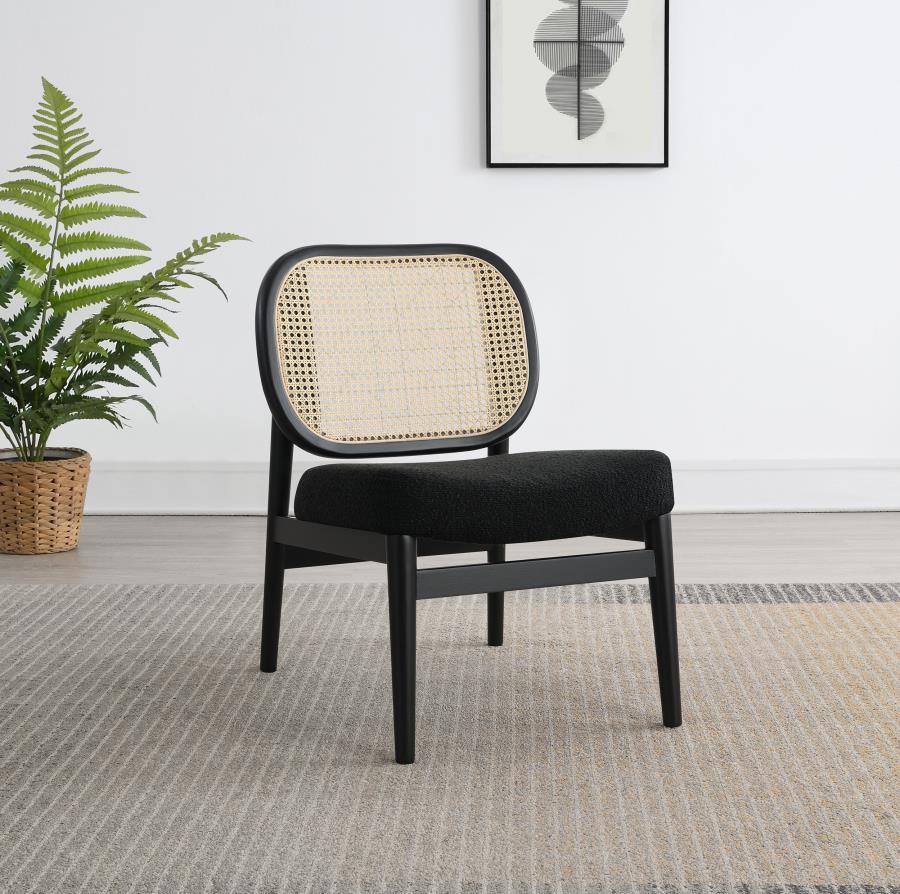 This accent chairs introduces a warm, airy presence to any living area. Lounge chair features a rattan open cane webbing back that breathes natural style and a fabric upholstered cushioned seat for soft, supportive comfort. The solid hardwood frame provid