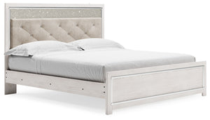  a pearlized finish and button-tufted upholstery bring a glam touch to the richly rustic appearance. Remote-contro