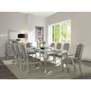 With gorgeous details, Francesca offers clean lines with contemporary design. A champagne finish with mirror trim inlay apron, mirrors inlay on the table top, crystal-like button seat back and cabriole leg make an impressive statement. Matching server and