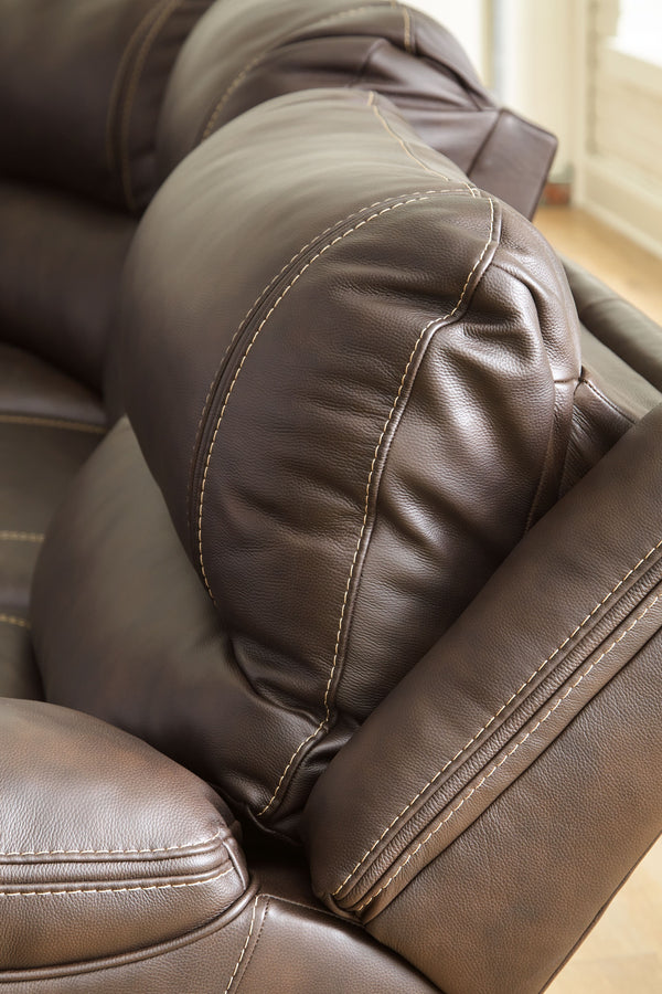  clean-lined and contemporary way with this power reclining loveseat in chocolate brown. Rest assured