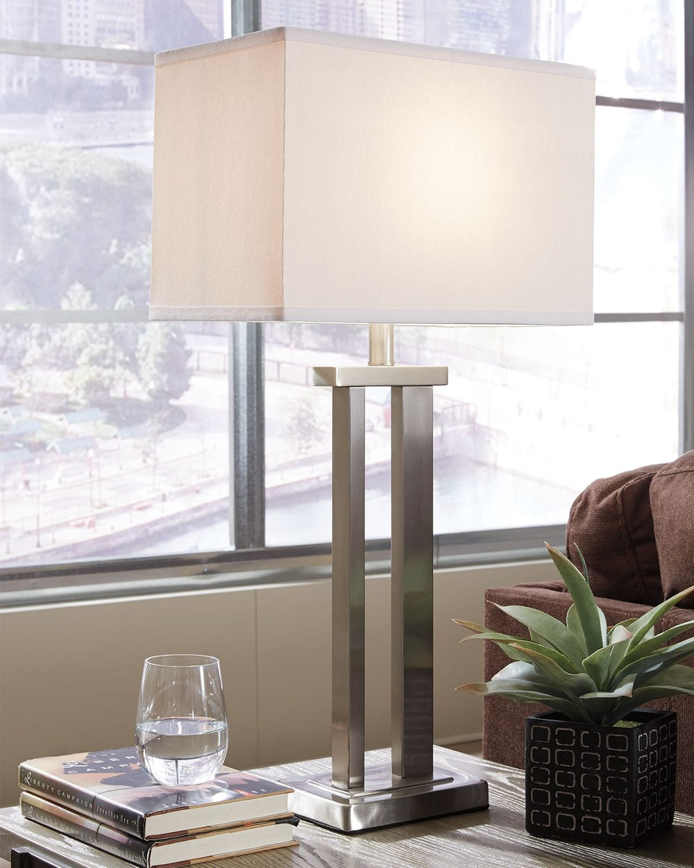 With a shiny finish and detailed clean lines, this is a winning table lamp. Its neutral design will pair back to almost any living space.<br><br><b>Additional Dimensions</b><br><ul><li>Shade: 0-"</li><li>Base: 0-"</li><li>Cord length: 96-"</li></ul><br/><
