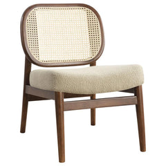 This accent chairs introduces a warm, airy presence to any living area. Lounge chair features a rattan open cane webbing back that breathes natural style and a fabric upholstered cushioned seat for soft, supportive comfort. The solid hardwood frame provid