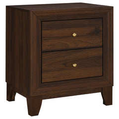 Introduce a sense of richness and depth to your bedside with a modern two-drawer nightstand. Crafted in durable laminate with a walnut finish, it lends warmth and stylish flair. A pair of drawers create ample space for bedside essentials, everything from 