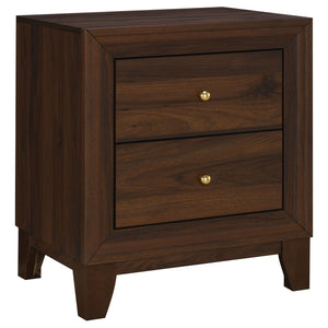 Introduce a sense of richness and depth to your bedside with a modern two-drawer nightstand. Crafted in durable laminate with a walnut finish, it lends warmth and stylish flair. A pair of drawers create ample space for bedside essentials, everything from 