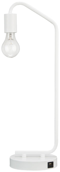 Brilliant in its minimalist form, this desk lamp suspends its exposed bulb in one sleek swoop. Constructed of metal, the compact, lightweight lamp is portable and features a single USB charging port. We see it glowing bedside, on a bookshelf or on either 