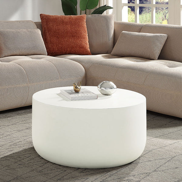 The Dustan round coffee table boasts a sleek, modern design with its fixed table top and faux concrete finish. Ideal for contemporary spaces, it offers a minimalist aesthetic that effortlessly enhances any living area. This stylish piece is perfect for th