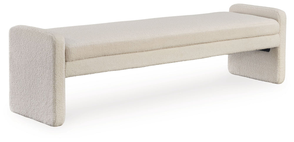 This accent bench helps you craft a cozy space without sacrificing the high-style vibe you love. Clean lines and a simple silhouette give it a contemporary, tailored feel. Inviting faux shearling fabric and rounded edges soften the look. Whether it-'s at 