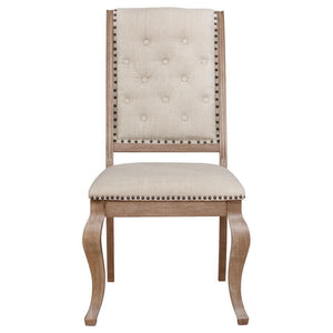  wide seat for optimal comfort. Its upholstered back is button tufted in a classic diamond motif