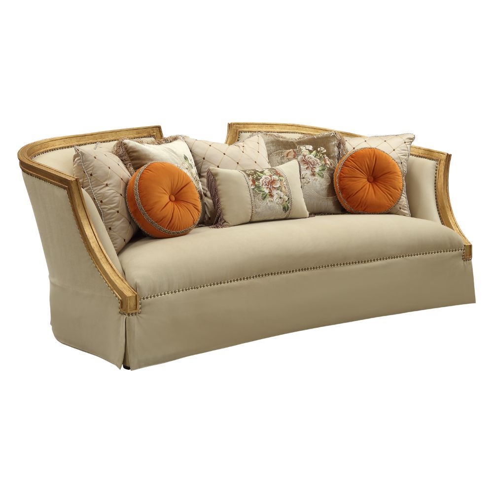 The Daesha sofa is a sophisticated traditional design, with its soft curve upholstered tight back wrapping around with a half ellipse cut out at the center top. This inviting surround appeal is accented by loose pillows upon coil seat cushions to allow fo
