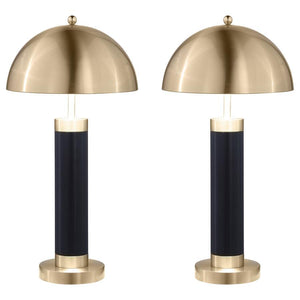 This pair of modern table lamps brings striking contrast with a bold black cylindrical base and gleaming dome-shaped shade. The column silhouette offers sculptural simplicity, while the brushed metal finish adds a sophisticated, polished accent. Ideal as 