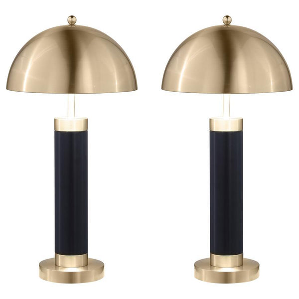 This pair of modern table lamps brings striking contrast with a bold black cylindrical base and gleaming dome-shaped shade. The column silhouette offers sculptural simplicity, while the brushed metal finish adds a sophisticated, polished accent. Ideal as 