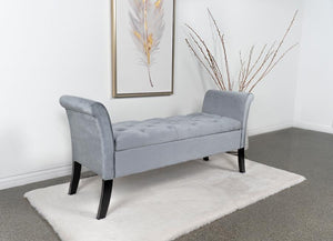  it boasts flared arms and meticulous button-tufting
