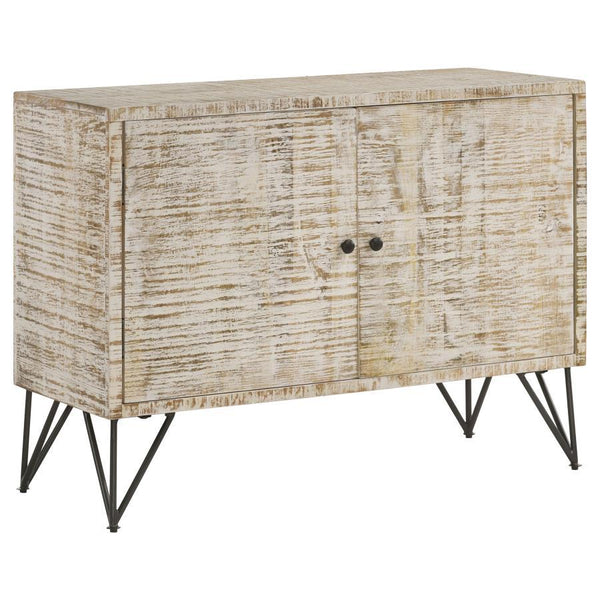 Bring a modern expression to your bohemian style space with this rustic industrial accent cabinet. A large and boxy, rectangular frame grounds a focal wall and welcomes a table lamp and decor along its narrow top surface. Double cabinet doors open up to r