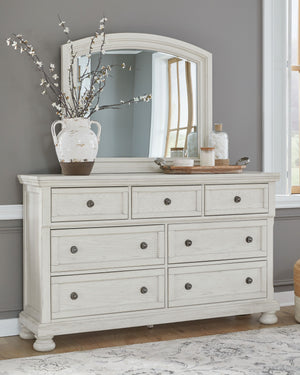  MDF and solid wood components. Antique white finish with a wonderful grain texture. Dovetail drawer construction with metal ball bearing side glides and dark bronze-toned knobs. Upper drawers featu