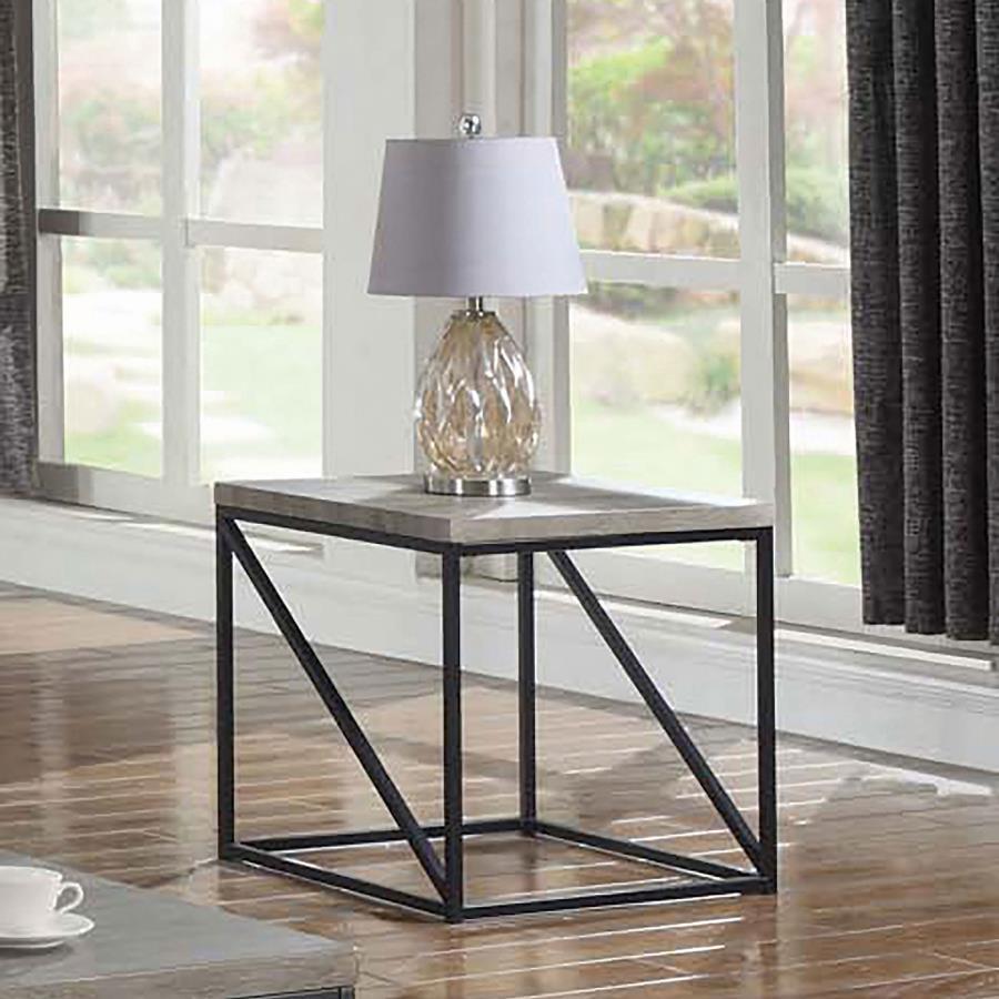 Upgrade your living space with this contemporary end table, combining functionality and style. The engineered wood top features a scratch-resistant laminate veneer in a sonoma grey finish for a wood-like appearance and lasting durability. Supported by a b