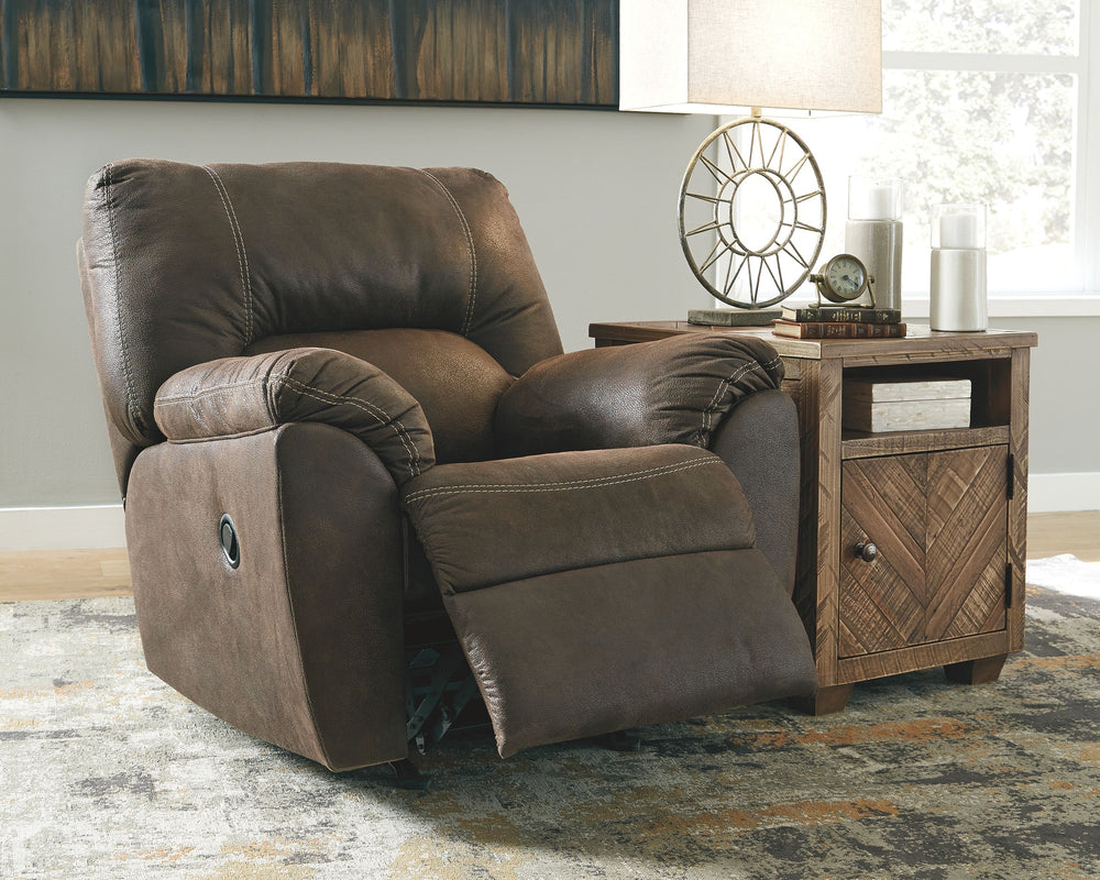 With plush cushions and wraparound pillow top arms, this sectional set takes comfort to a whole new level. Faux vintage leather requires minimal care, making this relaxation station ideal in homes with children and pets. Reclining feature engages with the