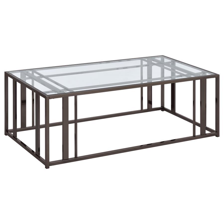 This modern rectangular coffee table features a clear tempered glass top paired with a geometric base made from heavy-gauge metal with a sleek electroplated finish. The open design offers a contemporary aesthetic, blending elegance with durability. Perfec