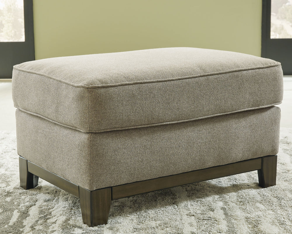 Whether your style is American classic, contemporary or an eclectic mix, this beautifully versatile ottoman is sure to look right at home. Distinctive elements include an exposed base, welt trim and a decadently plush woven upholstery in a rich neutral sh