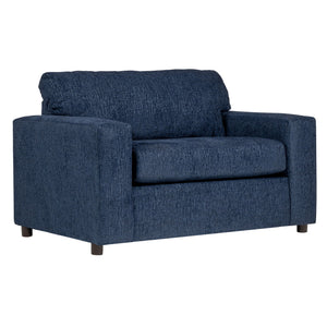 Discover the Kylo Cuddle Chair, a cozy haven designed for unparalleled relaxation. Crafted with easy-care deep blue upholstery, this transitional piece seamlessly blends into any space. Sink into its oversized frame, complete with square arms and plush pi